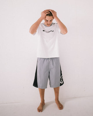 Man wearing Carnage Hybrid Waist Boardshort in Stone Grey