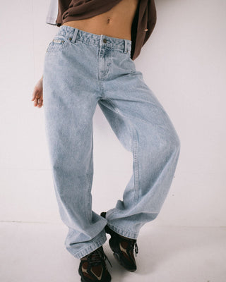 Woman wearing Gangsta Baggy Low Rise Jean in True Blue