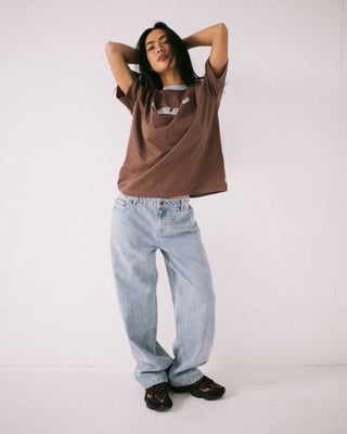 Woman wearing Gangsta Baggy Low Rise Jean in True Blue