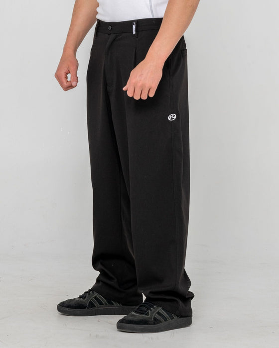 man-wearing-jasper-baggy-pleated-suit-pant-in-black
