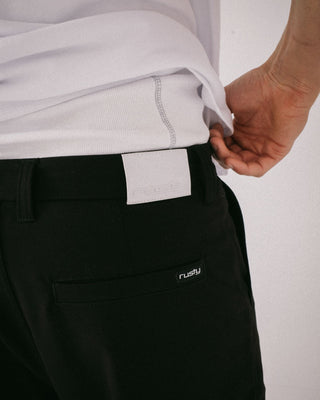 Man wearing Jasper Baggy Pleated Suit Pant in Black