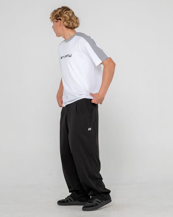 man-wearing-jasper-baggy-pleated-suit-pant-in-black