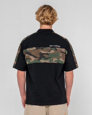 Man wearing Kill Switch Short Sleeve Polo in Black