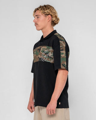 Man wearing Kill Switch Short Sleeve Polo in Black