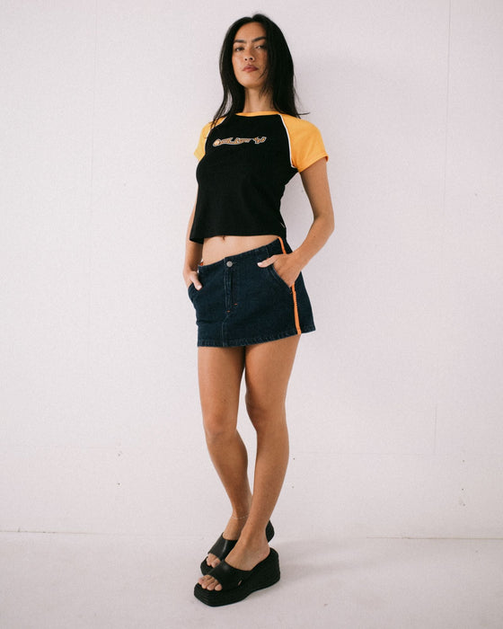 woman-wearing-webber-denim-low-rise-micro-mini-skirt-in-indigo