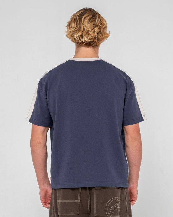 man-wearing-weapon-short-sleeve-tee-in-dark-blue