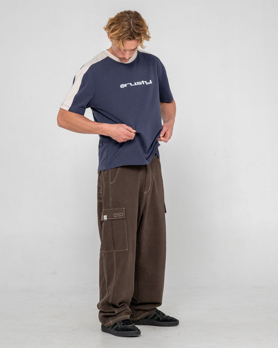 man-wearing-weapon-short-sleeve-tee-in-dark-blue