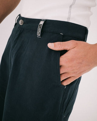 Man wearing Strikewear Baggy Twill Short in Dark Blue