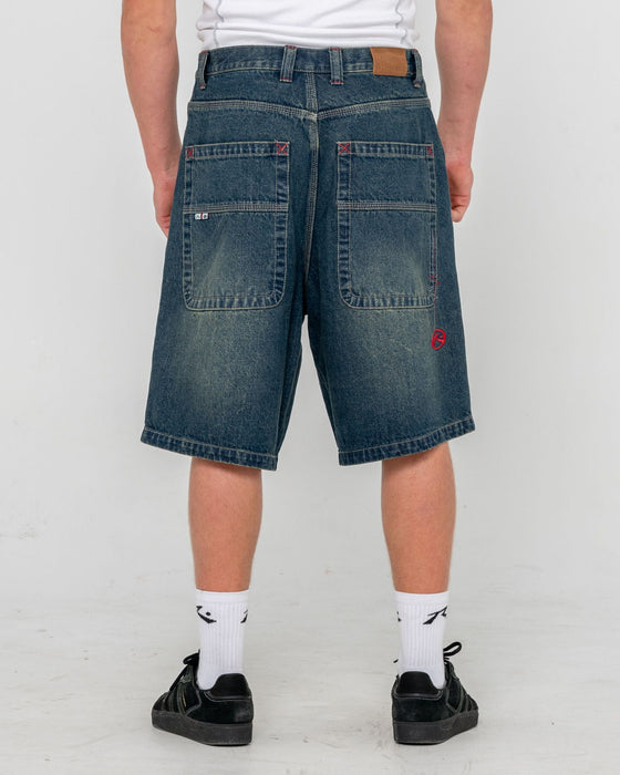 man-wearing-yowie-baggy-jort-in-dark-n-dirty