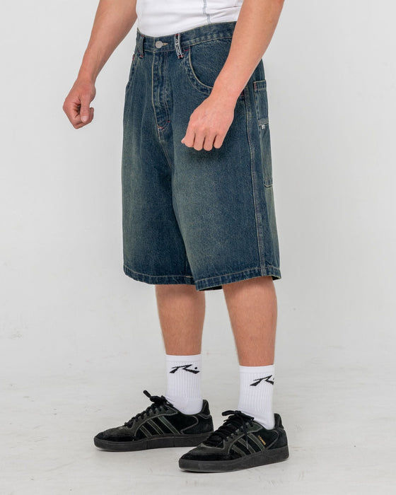 man-wearing-yowie-baggy-jort-in-dark-n-dirty