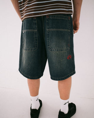 Man wearing Yowie Baggy Jort in Dark N Dirty