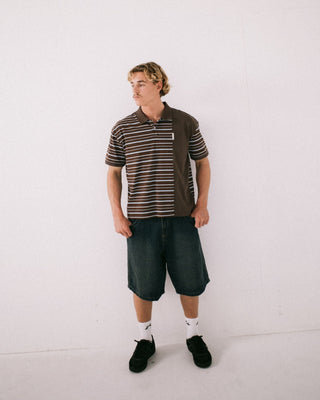 Man wearing Yowie Baggy Jort in Dark N Dirty