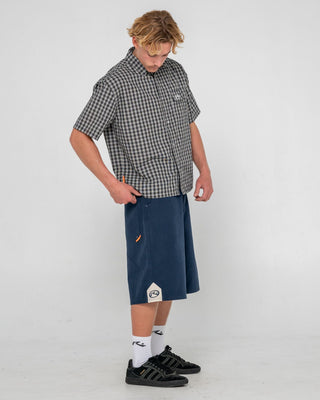 Man wearing Check 1 Check 2 Short Sleeve Shirt in Black