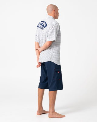 Man wearing Morning Glory Fixed Waist Boardshort in Navy Blue