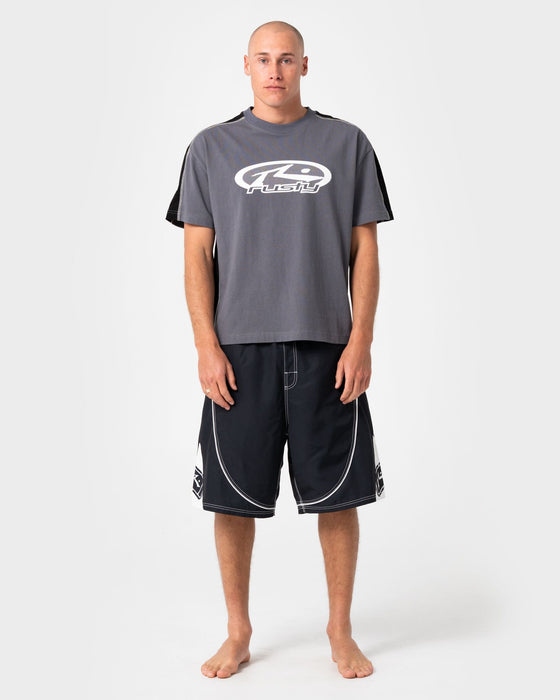 man-wearing-deathroll-hybrid-waist-boardshort-in-black