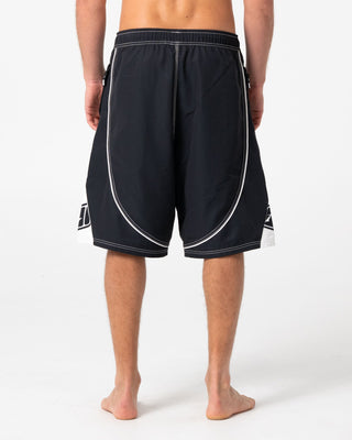 Man wearing Deathroll Hybrid Waist Boardshort in Black