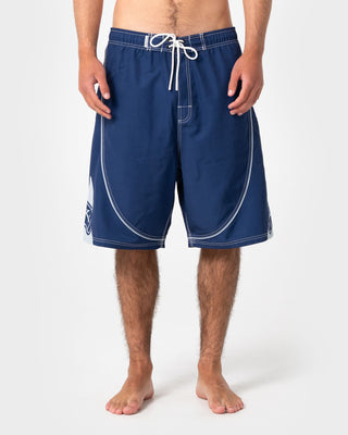 Man wearing Deathroll Hybrid Waist Boardshort in Dark Blue