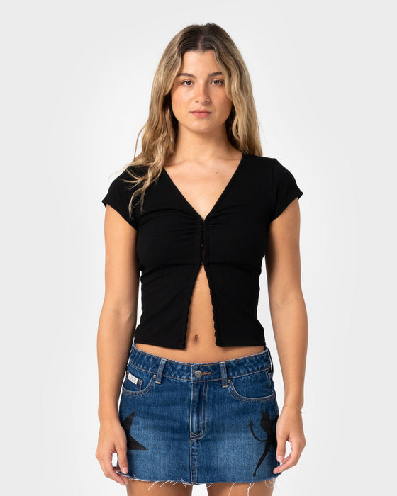 woman-wearing-im-hooked-cap-sleeve-fashion-top-in-black
