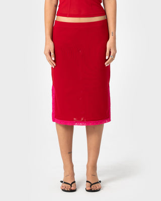 Woman wearing Camden Mesh Midi Skirt in Red / Fushia