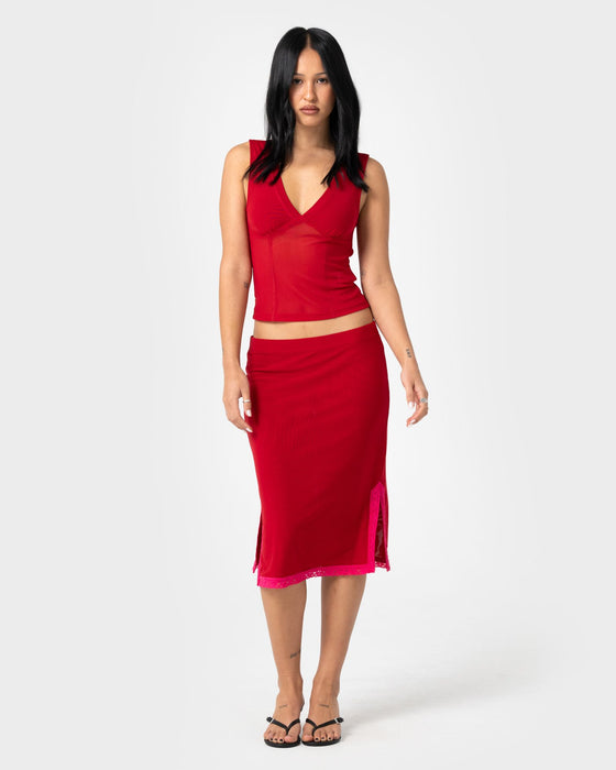 woman-wearing-camden-mesh-midi-skirt-in-red-fushia