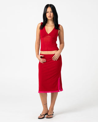 Woman wearing Camden Mesh Midi Skirt in Red / Fushia