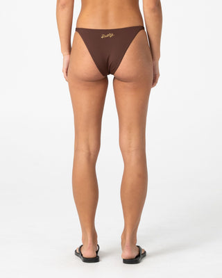 Woman wearing La Cabana Ring Midi Bikini Bottom in Java