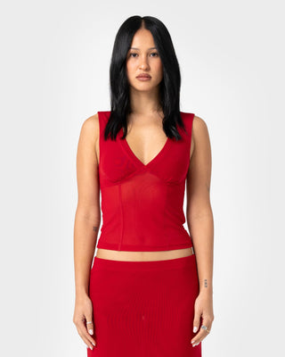 Woman wearing Vixen Vee Neck Tank in Red