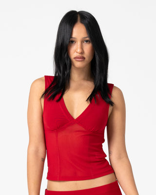 Woman wearing Vixen Vee Neck Tank in Red