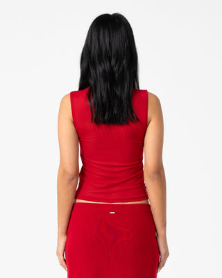 Woman wearing Vixen Vee Neck Tank in Red