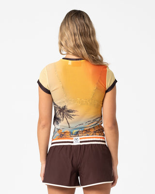 Woman wearing La Cabana Mesh Baby Tee in La Cabana Print