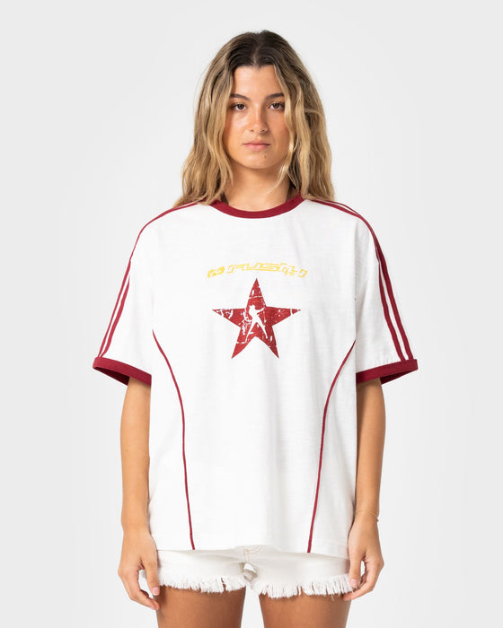 woman-wearing-starred-devil-oversized-tee-in-cream-red