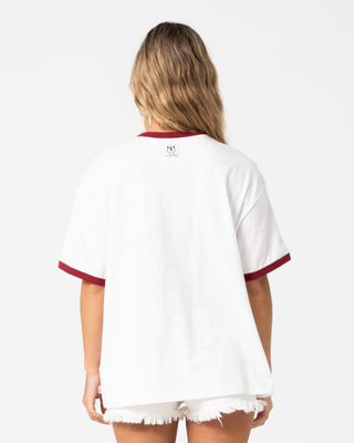 Woman wearing Starred Devil Oversized Tee in Cream / Red