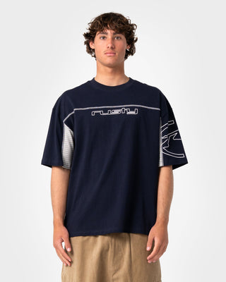 Man wearing Cyber Stripe Short Sleeve Tee in Navy Blue
