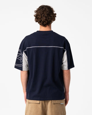 Man wearing Cyber Stripe Short Sleeve Tee in Navy Blue