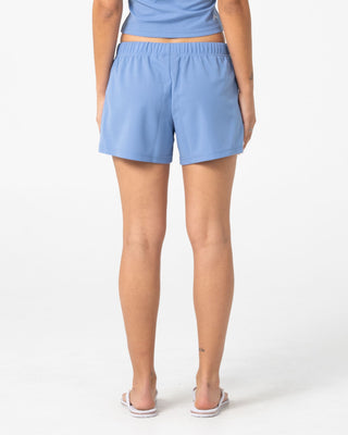 Woman wearing Weekender Low Rise Trackshort in Tranquil