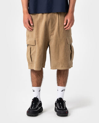 Man wearing Cobra Cord Elastic Cargo Short in Khaki