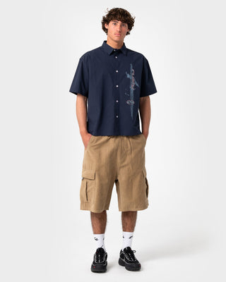 Man wearing Cobra Cord Elastic Cargo Short in Khaki