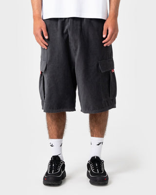 Man wearing Cobra Cord Elastic Cargo Short in Steel