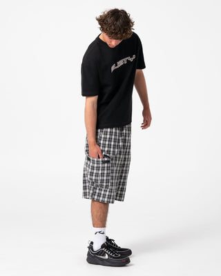 Man wearing Screwdriva Elastic Cargo Short in Black