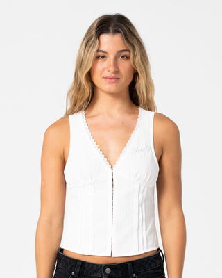 Woman wearing Peggy Sue Sleeveless Button Down Blouse in White