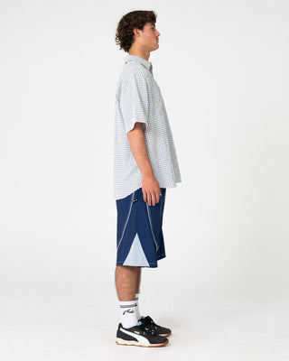 Man wearing Defender Short Sleeve Shirt in Cream