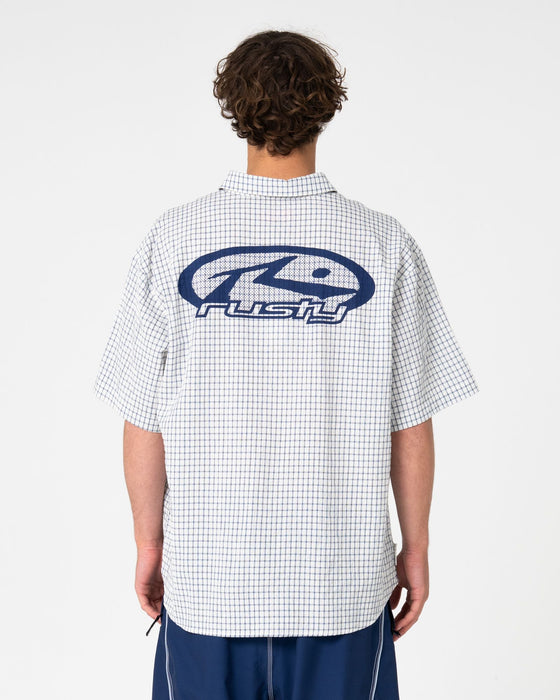 man-wearing-defender-short-sleeve-shirt-in-cream