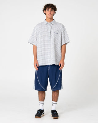 Man wearing Defender Short Sleeve Shirt in Cream