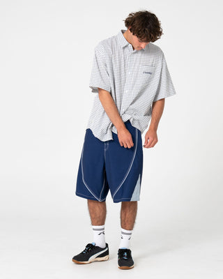 Man wearing Defender Short Sleeve Shirt in Cream