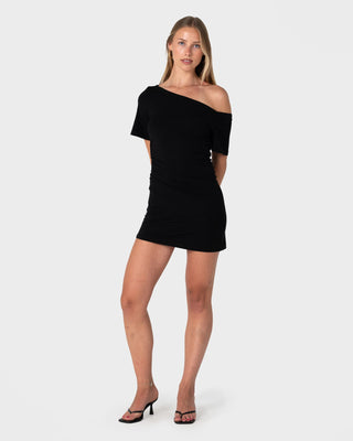 Woman wearing Sally Slouch Off Shoulder Dress in Black