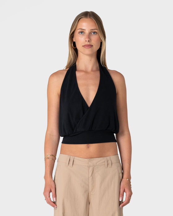 woman-wearing-honey-halter-top-in-black