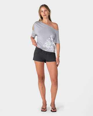 Woman wearing Sally Slouch Printed Off Shoulder Top in Grey / White