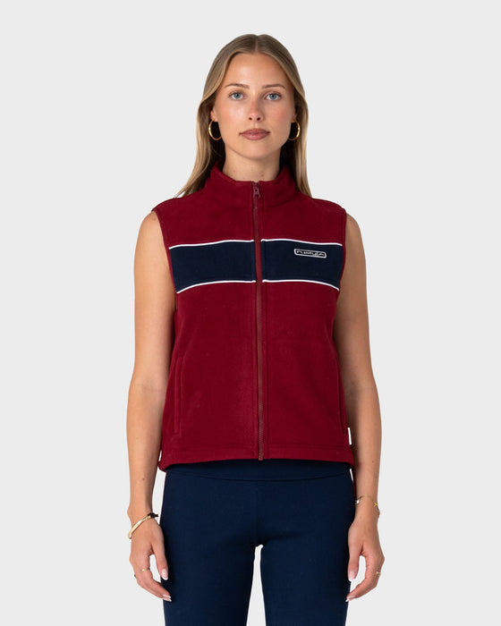 woman-wearing-bless-up-polar-fleece-vest-in-cranberry-navy-blue