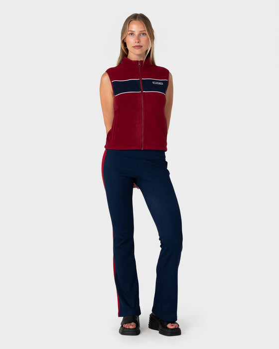woman-wearing-bless-up-polar-fleece-vest-in-cranberry-navy-blue