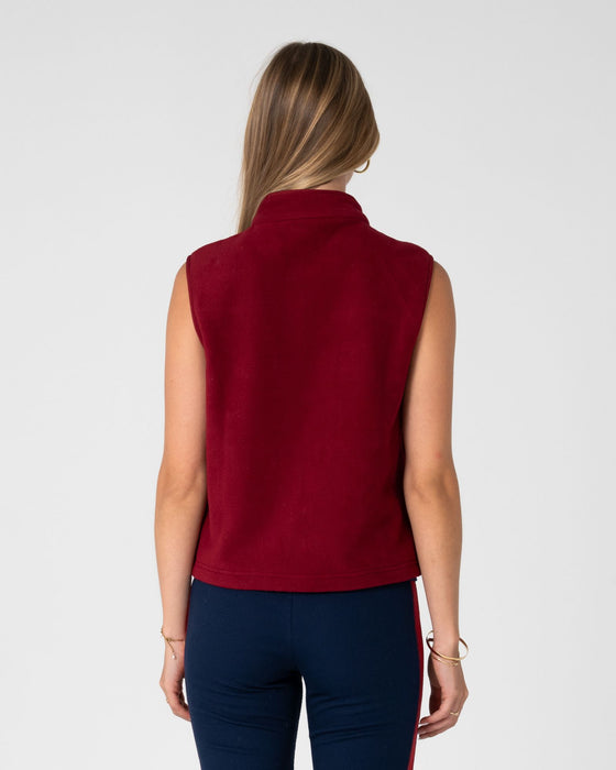 woman-wearing-bless-up-polar-fleece-vest-in-cranberry-navy-blue